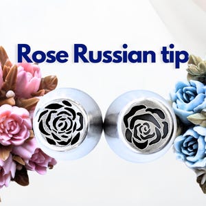 May include: Two stainless steel Rose Russian tips with a rose design, surrounded by pink and blue floral decorations. The text "Rose Russian tip" is displayed in blue.