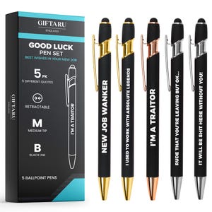 May include: A set of five black ballpoint pens with gold, silver, and rose gold detailing. Each pen has a different quote, such as "I'm a Traitor" and "New Job Wanker." The box is labelled "Good Luck Pen Set" and "5 Ballpoint Pens."