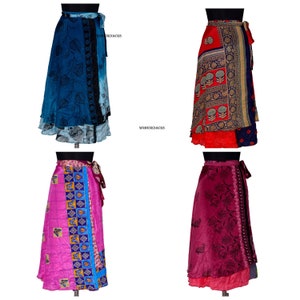 May include: Four different patterned wrap skirts. The skirts are made of silk and have a variety of colors and designs. The skirts are all long and flowy.