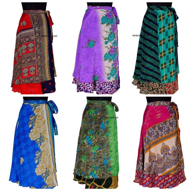 May include: Six different colorful wrap skirts made from recycled silk saris. Each skirt has a unique pattern and color combination. The skirts are all long and flowy, and they would be perfect for a variety of occasions.