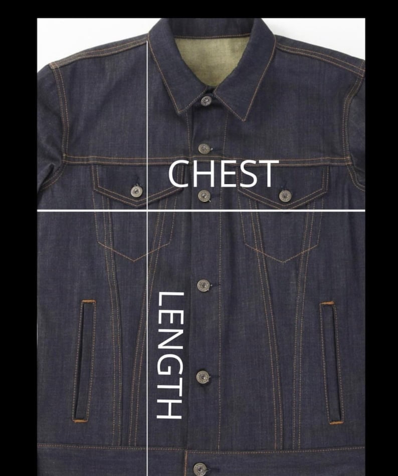 May include: A dark blue denim jacket with a button closure and two chest pockets. The jacket has a length measurement marked on the front.