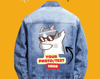 May include: A blue denim jacket with a cartoon cat wearing sunglasses and a bandana. The cat is holding a sign that says "Be Kind to Your Mind". The jacket has a white patch that says "YOUR PHOTO/TEXT HERE".