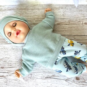Puppenkleidung 36 cm Set: Pulli, Puppenhose, Mütze imagem 4