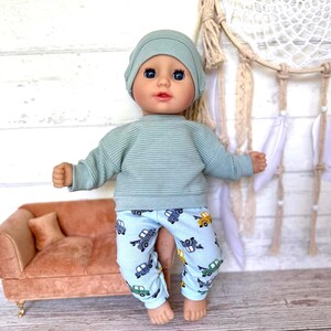 Puppenkleidung 36 cm Set: Pulli, Puppenhose, Mütze imagem 7