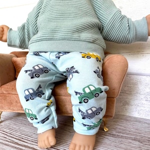 Puppenkleidung 36 cm Set: Pulli, Puppenhose, Mütze imagem 3