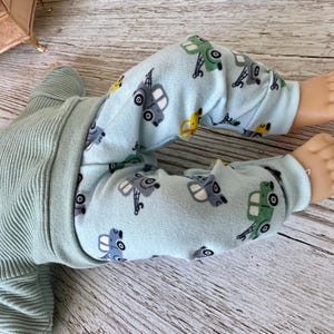 Puppenkleidung 36 cm Set: Pulli, Puppenhose, Mütze imagem 6