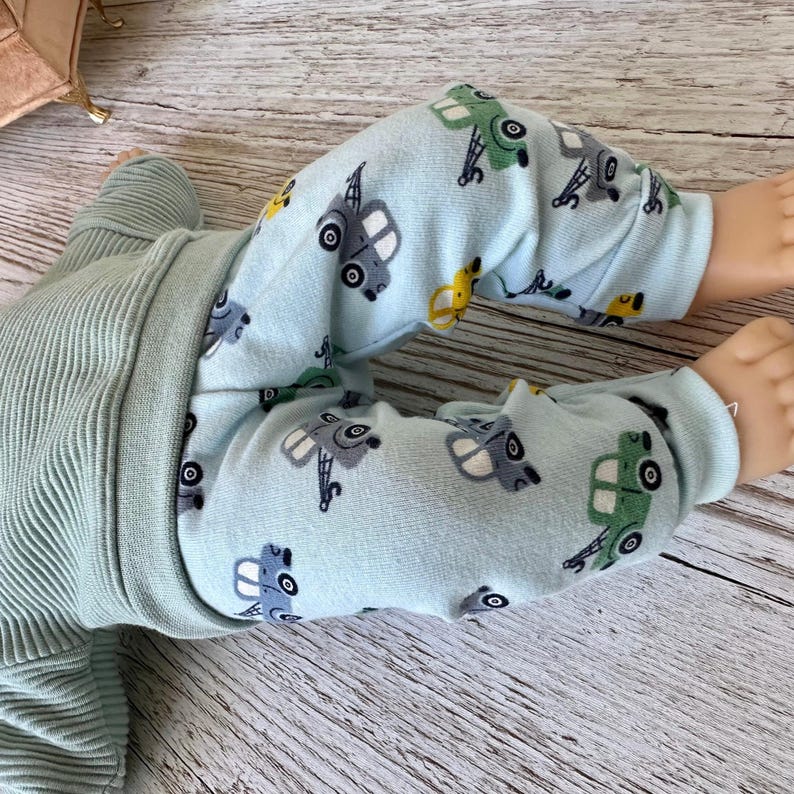 Puppenkleidung 36 cm Set: Pulli, Puppenhose, Mütze imagem 6