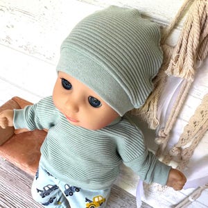 Puppenkleidung 36 cm Set: Pulli, Puppenhose, Mütze imagem 2
