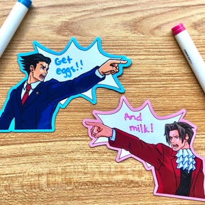 May include: Two anime-style stickers with characters pointing. One sticker has a character in a blue suit with the text "Get eggs!!" in a speech bubble. The other sticker has a character in a red suit with the text "And milk!" in a speech bubble.