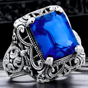 Vintage 925 Sterling Silver Filigree Ring: 4.00 Carat London Blue Topaz 191