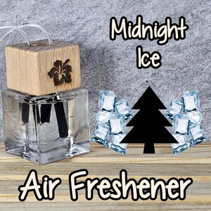 May include: A clear glass air freshener with a wooden top featuring a carved flower design. The words "Midnight Ice" and "Air Freshener" are written in a stylized font. A black tree and ice cubes are also in the image.