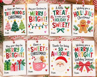 May include: Eight rectangular white paper gift tags with red and white twine strings. Each tag features colorful holiday-themed illustrations including Christmas trees, gingerbread men, Santa Claus, gifts, and festive text greetings.