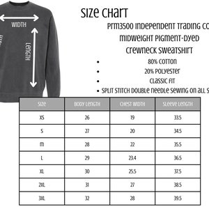 May include: A dark gray crewneck sweatshirt with a size chart. The size chart includes measurements for body length, chest width, and sleeve length in inches. The sweatshirt is made of 80% cotton and 20% polyester.