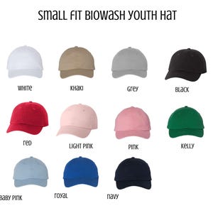May include: A collection of small-fit, biowash youth hats in various colors. The hats are displayed in white, khaki, grey, black, red, light pink, pink, kelly green, baby pink, royal blue, and navy.