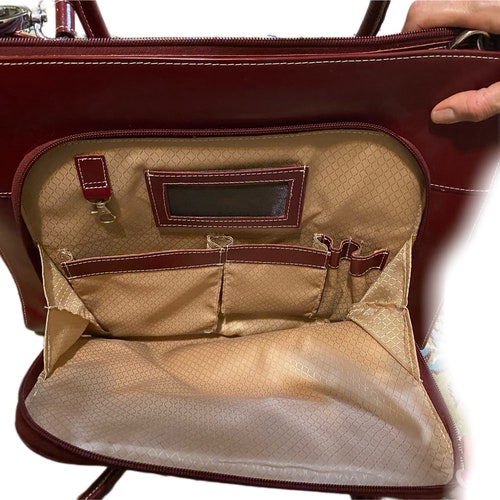 McKlein USA 15” red leather litigator briefcase, laptop or travel. Series shops W. Highest quality leather and in like new condition.