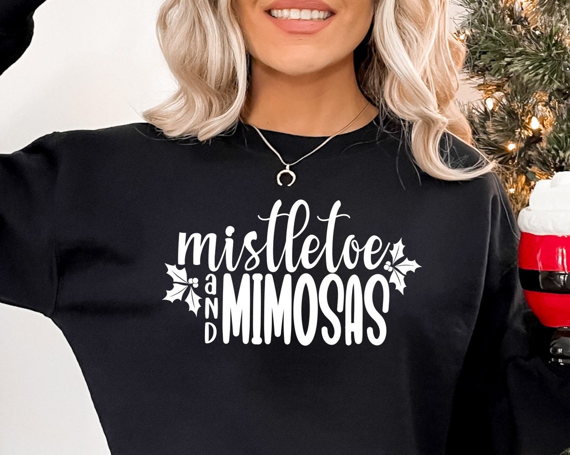 mistletoe and mimosas sweatshirt
