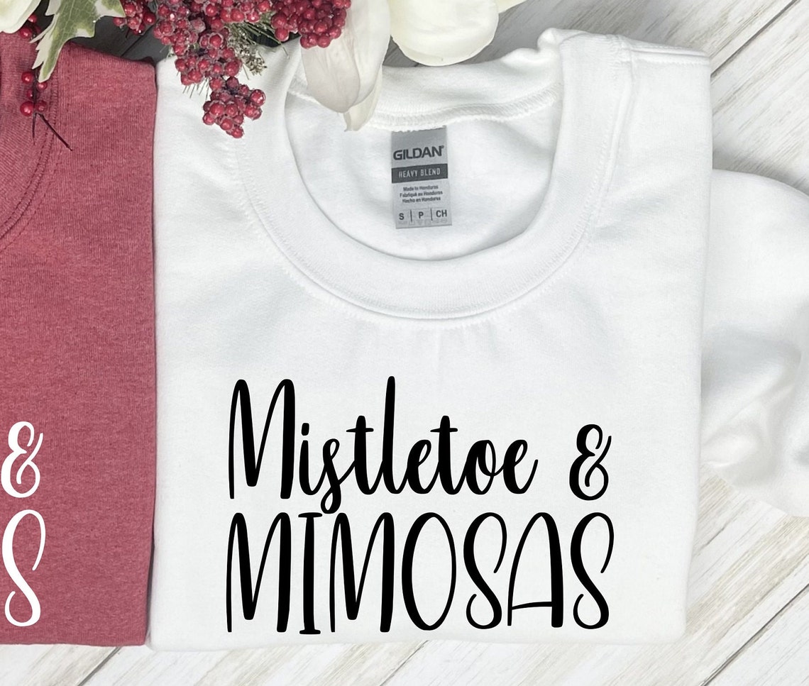 mistletoe and mimosas sweatshirt