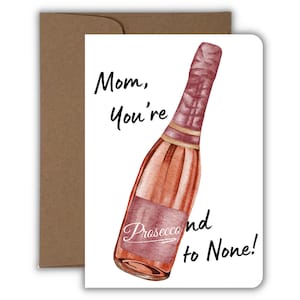 May include: A greeting card with a watercolor illustration of a champagne bottle in shades of pink and gold. The card reads "Mom, You're Prosecco-nd to None!" and is paired with a brown envelope.