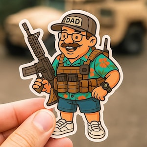 May include: A sticker featuring a cartoon illustration of a man wearing a hat with the word "DAD", glasses, and a tactical vest, holding a rifle. He is also wearing a Hawaiian shirt and shorts. The sticker is held by a hand.