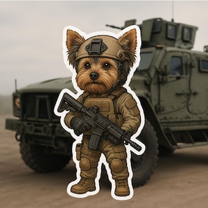 May include: A sticker featuring a Yorkshire Terrier in military gear, including a helmet, tactical vest, and boots, holding a rifle. The dog is brown and tan, set against a blurred background of a military vehicle and a neutral sky.