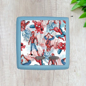 May include: A blue zippered case with a white background and a repeating pattern of red and blue Spiderman characters.