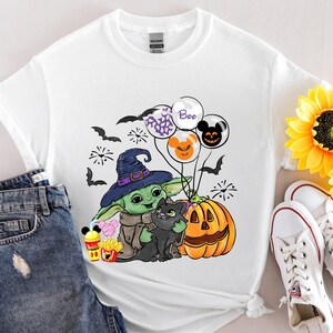 👻🎃 Trick or Treat with The Cutest Force in the Galaxy! 👽🧡

Celebrate Halloween the Mandalorian way with this adorable Baby Yoda Trick or Treat Shirt! Whether you're heading out for candy, hosting a Halloween party, or just binge-watching spooky movies, this tee or sweatshirt will keep you looking cute and comfy all season long! 🍬🕸️