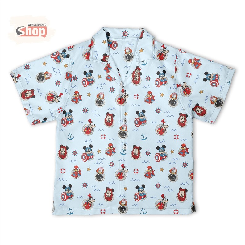 May include: A light blue short-sleeve button-down shirt featuring an all-over print of Disney characters dressed as superheroes, including Mickey Mouse as Captain America and Spider-Man, interspersed with nautical icons like anchors and ship wheels.