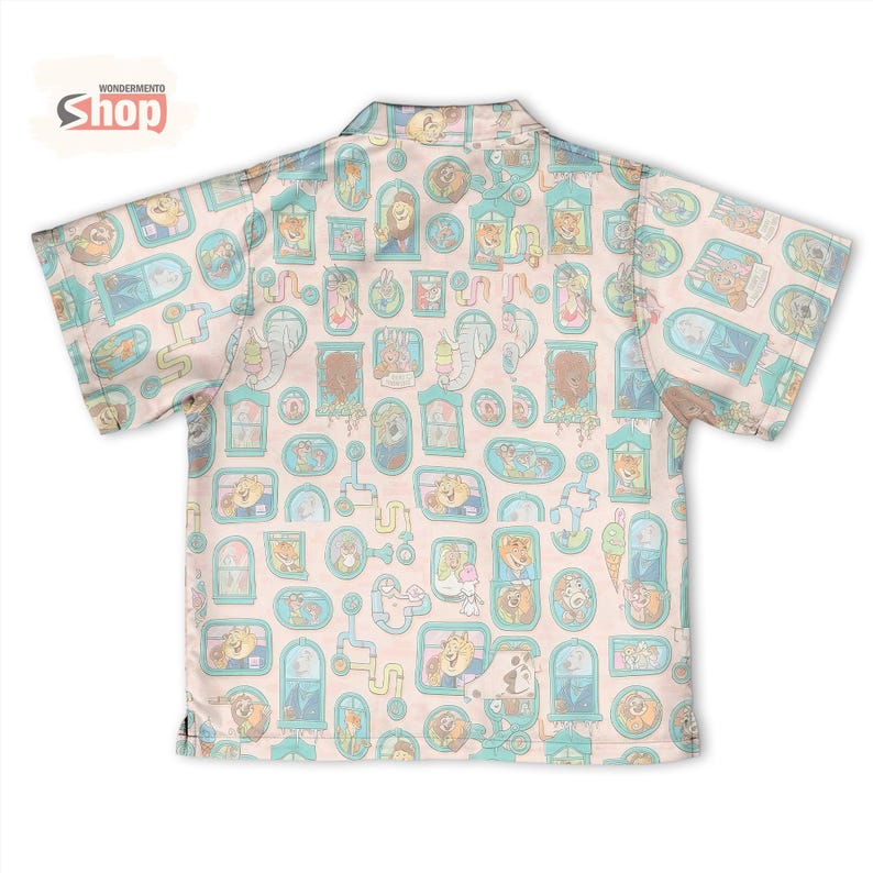 May include: Short-sleeved button-up shirt with a light pink background and a repeating pattern of cartoon animal portraits in teal frames. The shirt has a collar and is made of a lightweight fabric. The shop logo "WONDERMENTO Shop" is in the top left corner.
