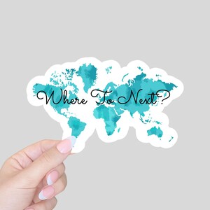May include: A teal blue watercolor world map sticker with the text "Where To Next?" in black cursive font.