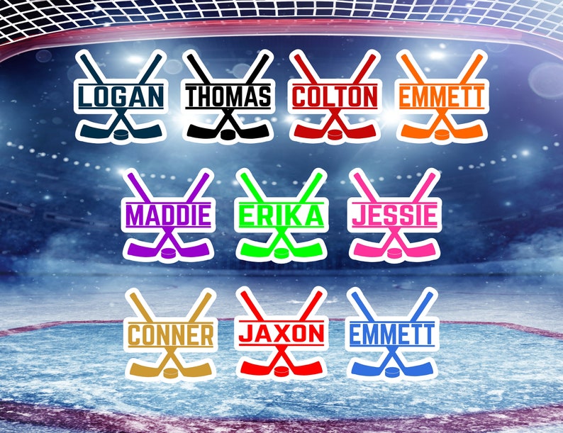 May include: Nine hockey stick decals with personalised names. The decals are in various colours, including blue, black, red, orange, purple, green, pink, gold, and light blue. The names on the decals are Logan, Thomas, Colton, Emmett, Maddie, Erika, Jessie, Conner, Jaxon, and Emmett.