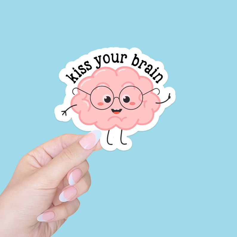 May include: A pink cartoon brain wearing glasses and smiling with the text "kiss your brain" above it.