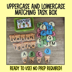 Könnte beinhalten: Ein Lernspiel mit Groß- und Kleinbuchstaben zum Zuordnen. Das Set enthält Eistütenkarten mit Buchstaben und Eiskugel-Karten mit entsprechenden Buchstaben. Der Text auf der Box lautet "UPPERCASE AND LOWERCASE MATCHING TASK BOX".