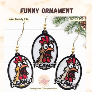 May include: Three wooden oval ornaments with a cartoon chicken design. The chicken has a red comb and wattle, with the text "F-CAW-F" below. The ornaments are laser-cut and ready for use. The text "FUNNY ORNAMENT" is at the top.