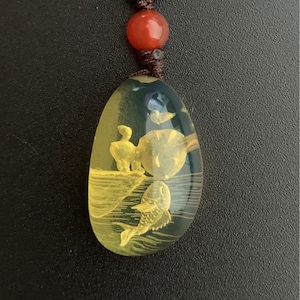 Amber Carving Art, Mexican Blue Amber Pendant, By famous carving artist, one of the kind amber pendant, genuine amber, very unique