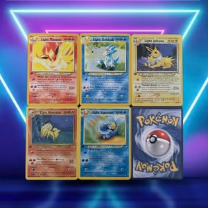 Neo Destiny Set 12/12 / Light Flareon 46, Golduck 47, Jolteon 48, Ninetales 50, Vaporeon 52 / First Edition / 2002 / PROXY Pokémon-kaart(en)