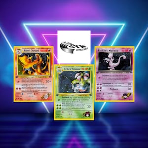 May include: Three Pokémon trading cards: Blaine's Charizard, Erika's Venusaur, and Rocket's Mewtwo. The Charizard card features an orange dragon, the Venusaur card shows a green plant-like creature, and the Mewtwo card displays a purple psychic Pokémon.