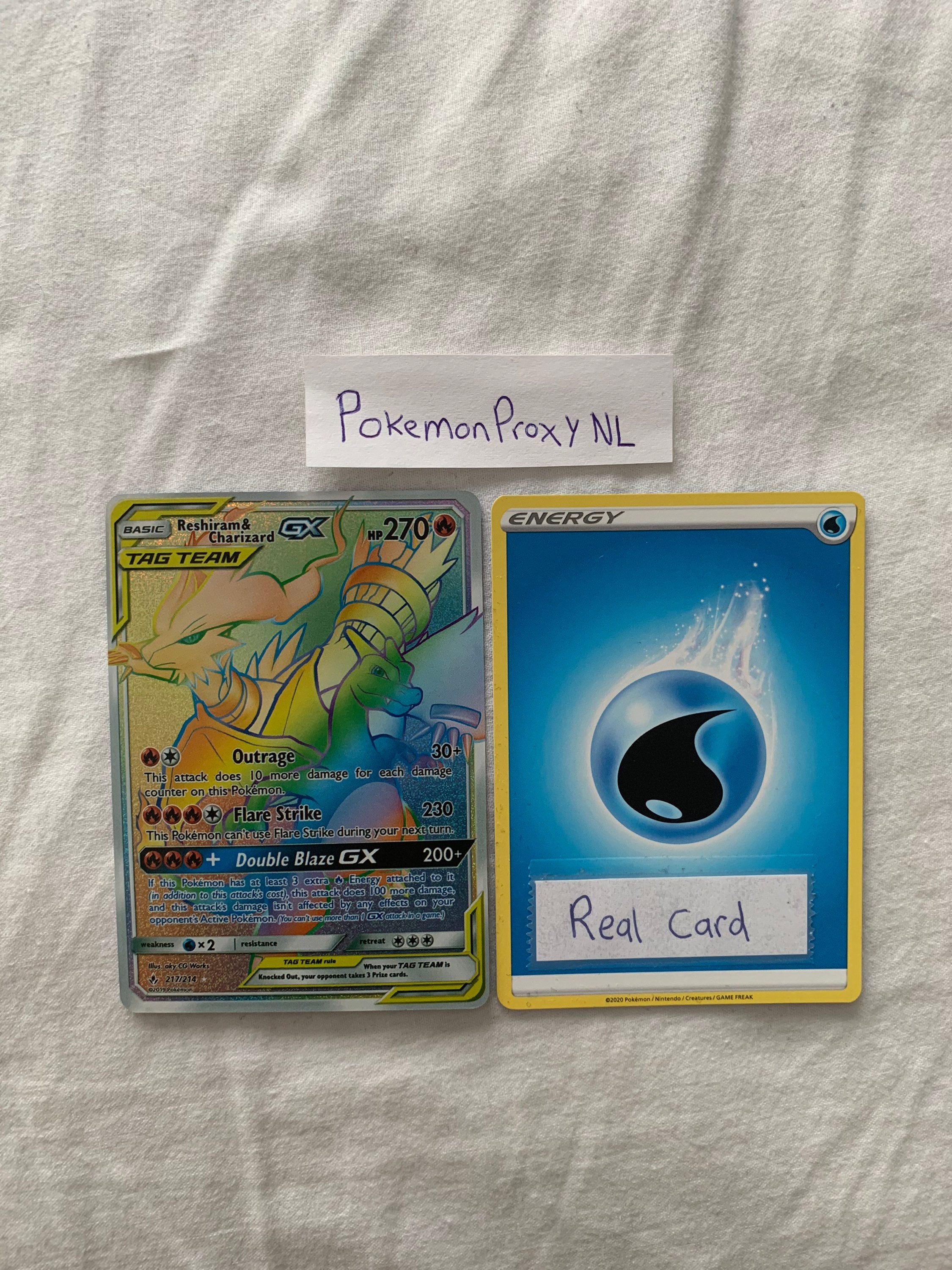 Rainbow Reshiram & Charizard GX 217/214 