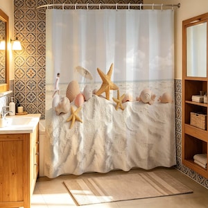 May include: A beach-themed shower curtain with a scenic view of a sandy beach, seashells, and starfish. The curtain features a white background with a beach scene and a row of seashells and starfish along the bottom. The bathroom has a wooden vanity and a patterned tile wall.