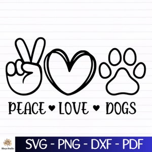 May include: Black and white graphic design with a peace sign, heart, and paw print. The text "Peace Love Dogs" is below the graphic.
