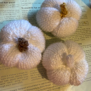 Knitted ghost pumpkins