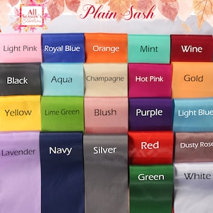 May include: A chart of 20 different colored satin ribbon swatches. The colors are: light pink, royal blue, orange, mint, wine, black, aqua, champagne, hot pink, gold, yellow, lime green, blush, purple, light blue, lavender, navy, silver, red, dusty rose, green, and white.