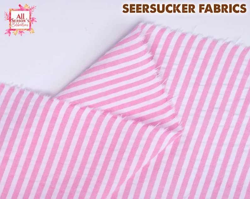 May include: Close-up of pink and white striped seersucker fabric. The fabric is folded, showing the texture and pattern. The words "SEERSUCKER FABRICS" are at the top. The logo for "All Season's Celebrations" is in the upper left corner.