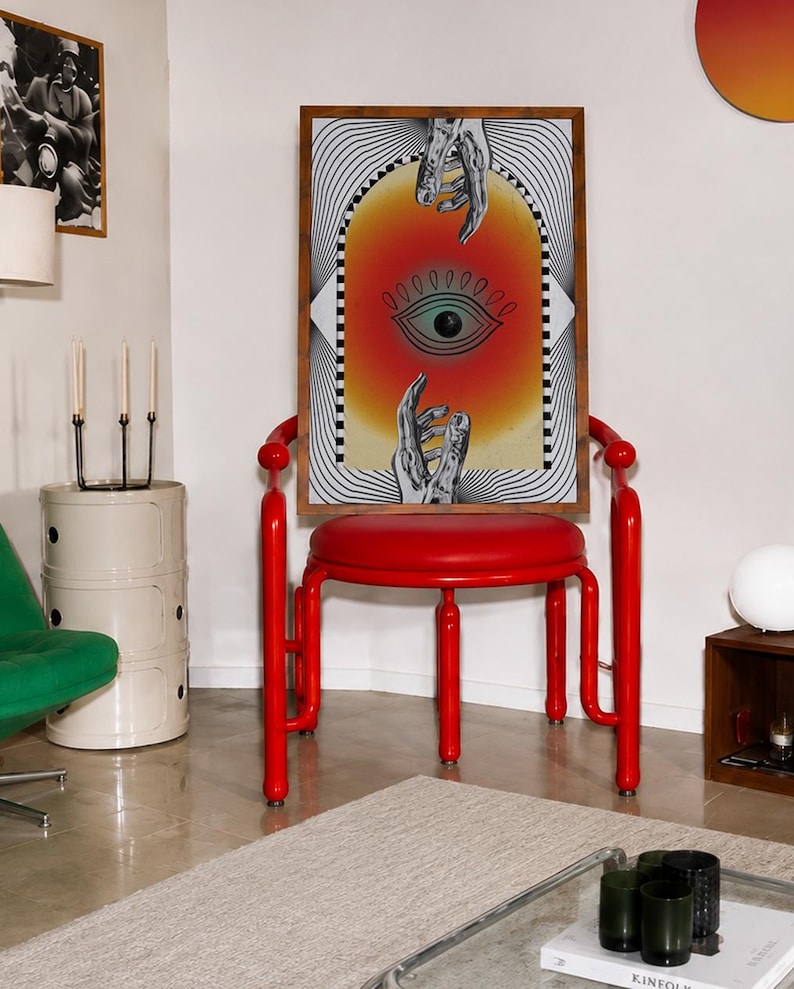 All seeing eye poster featuring a surreal central eye, chrome hands, black-and-white optical lines and a fiery orange gradient in a psychedelic collage style. Display this trippy art print in a living room, bedroom, studio, dorm or eclectic gallery wall to create a bold focal point with graphic movement and retro energy. Designed for collectors of surrealism, optical art and unconventional interiors who enjoy mysterious symbolism, vivid color and artwork that immediately starts a conversation.