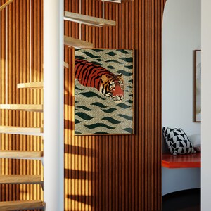 Stylized tiger illustration moving through abstract green wave patterns with dotted textures on a neutral background. The bold orange and black striped tiger contrasts with the rhythmic organic shapes, creating a dynamic maximalist composition. Hand drawn details and modern folk art influences give the artwork a playful yet powerful visual identity. Perfect for living room wall decor, kids room styling, eclectic interiors, or jungle themed spaces seeking a bold statement animal artwork.