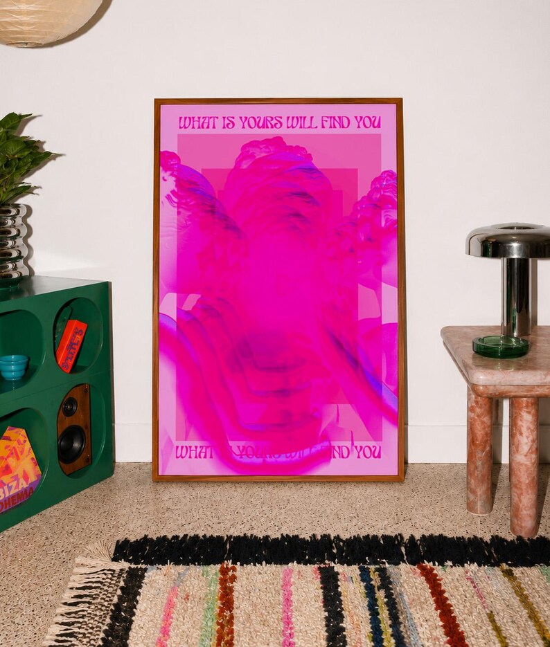 This pink glitch art print layers Greek and Roman statue busts in neon magenta, framed by retro typography and the phrase “What Is Yours Will Find You.” Repeated figures and digital distortion create a bold vaporwave collage with a surreal mood. Made to command attention in a bedroom, living room, studio or maximalist gallery wall, it adds electric color and bold attitude. A striking choice for collectors of classical sculpture, dopamine decor, Y2K graphics and uplifting quote posters.