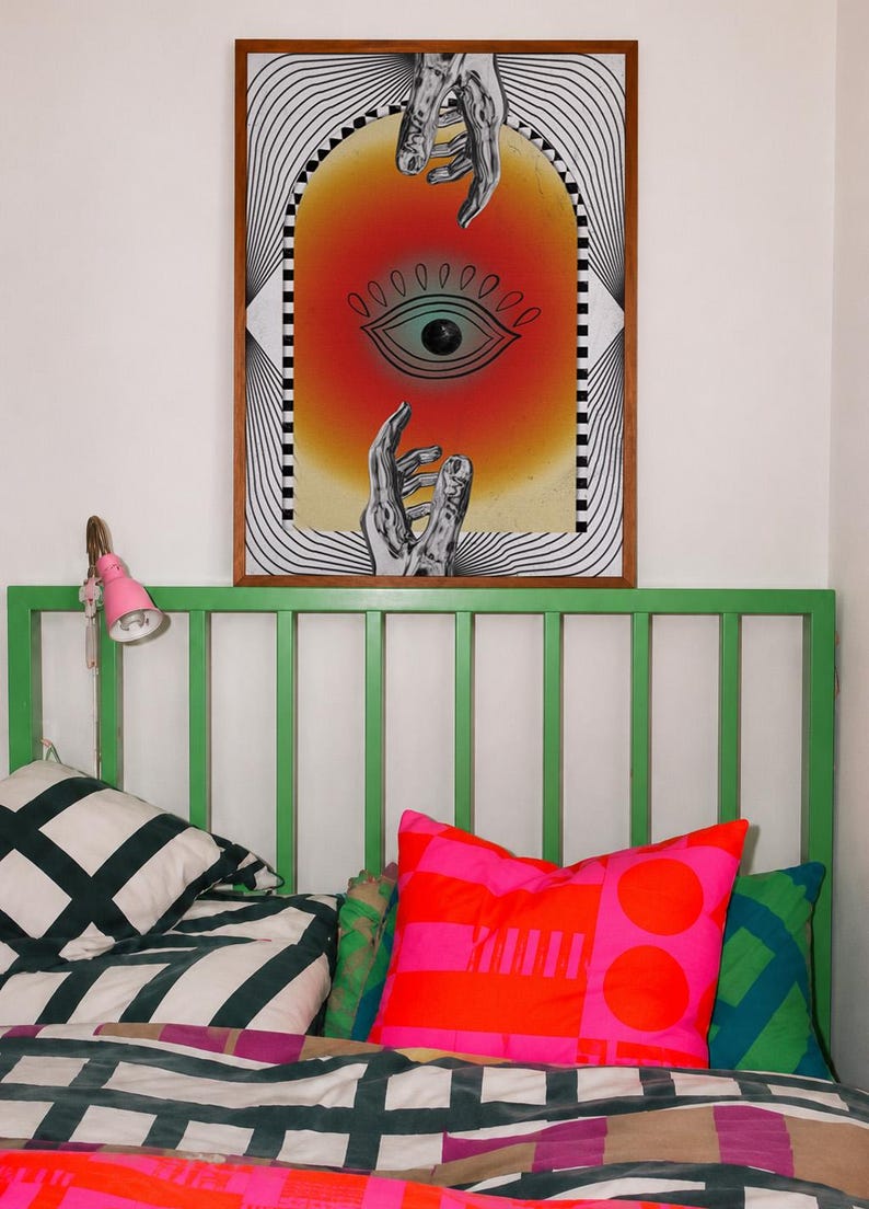 All seeing eye poster featuring a surreal central eye, chrome hands, black-and-white optical lines and a fiery orange gradient in a psychedelic collage style. Display this trippy art print in a living room, bedroom, studio, dorm or eclectic gallery wall to create a bold focal point with graphic movement and retro energy. Designed for collectors of surrealism, optical art and unconventional interiors who enjoy mysterious symbolism, vivid color and artwork that immediately starts a conversation.