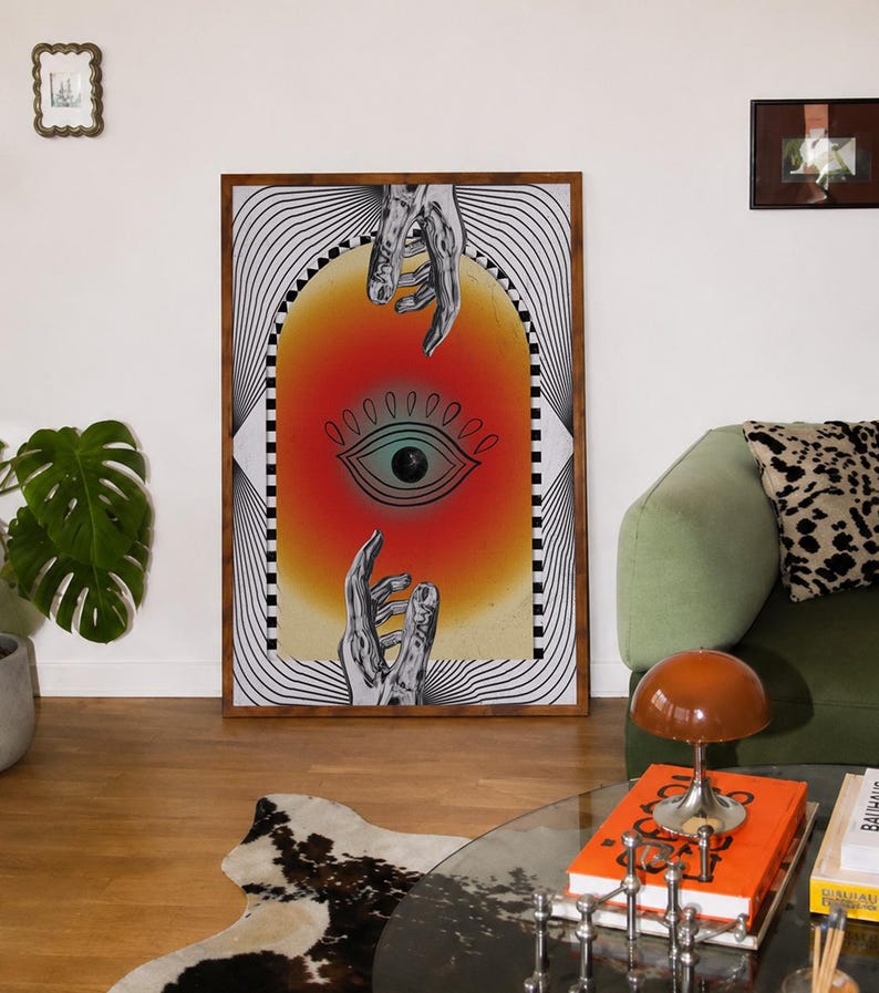 All seeing eye poster featuring a surreal central eye, chrome hands, black-and-white optical lines and a fiery orange gradient in a psychedelic collage style. Display this trippy art print in a living room, bedroom, studio, dorm or eclectic gallery wall to create a bold focal point with graphic movement and retro energy. Designed for collectors of surrealism, optical art and unconventional interiors who enjoy mysterious symbolism, vivid color and artwork that immediately starts a conversation.