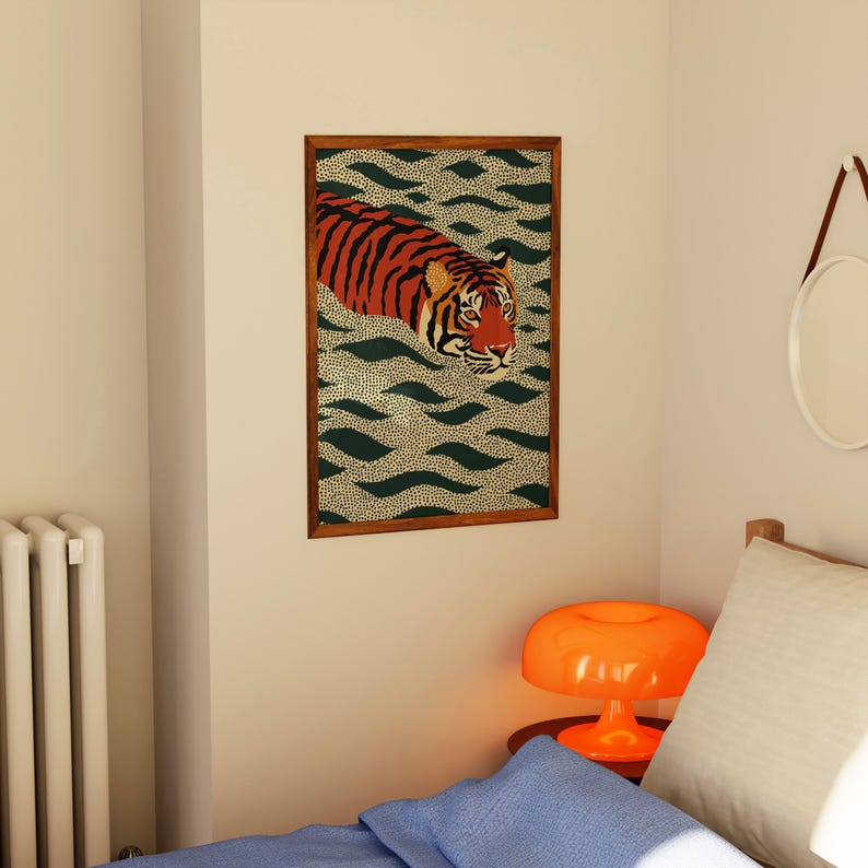 Stylized tiger illustration moving through abstract green wave patterns with dotted textures on a neutral background. The bold orange and black striped tiger contrasts with the rhythmic organic shapes, creating a dynamic maximalist composition. Hand drawn details and modern folk art influences give the artwork a playful yet powerful visual identity. Perfect for living room wall decor, kids room styling, eclectic interiors, or jungle themed spaces seeking a bold statement animal artwork.