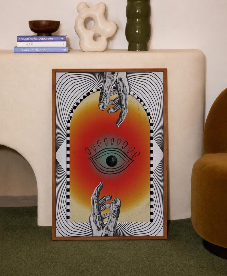 All seeing eye poster featuring a surreal central eye, chrome hands, black-and-white optical lines and a fiery orange gradient in a psychedelic collage style. Display this trippy art print in a living room, bedroom, studio, dorm or eclectic gallery wall to create a bold focal point with graphic movement and retro energy. Designed for collectors of surrealism, optical art and unconventional interiors who enjoy mysterious symbolism, vivid color and artwork that immediately starts a conversation.