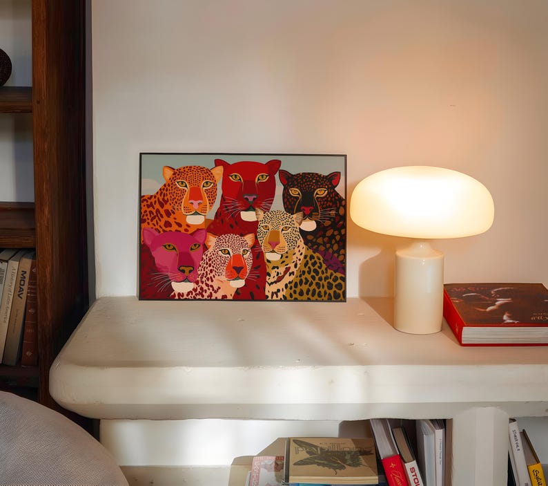 A vibrant maximalist illustration featuring a group of stylized leopards and panthers in bold red, orange, pink, and black tones. The artwork highlights expressive eyes, graphic patterns, and rich color contrasts, creating a striking statement piece inspired by modern folk art, dopamine decor, and eclectic interiors.Leopard Wall Art, Trendy Art Print, Big Cat Poster, Colorful Animal Art, Maximalist Decor, Wild Cat Design, Eclectic Home Art, Modern Folk Style, Red Aesthetic Poster, Dopamine Decor